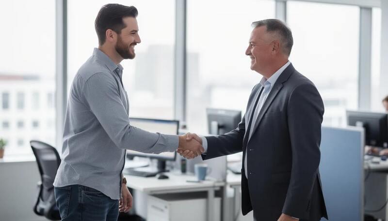 L'image montre un salarié souriant qui serre la main de son employeur, symbolisant la gratitude pour une collaboration fructueuse. Cette scène évoque des thèmes de travail et de relations professionnelles, rappelant l'importance de la reconnaissance dans le milieu professionnel.